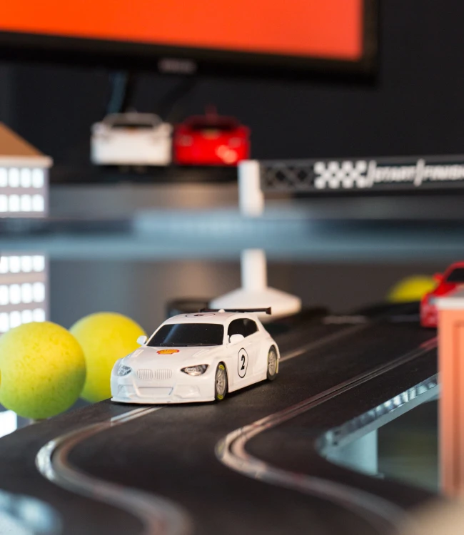 Closeup of white car on the scalextric